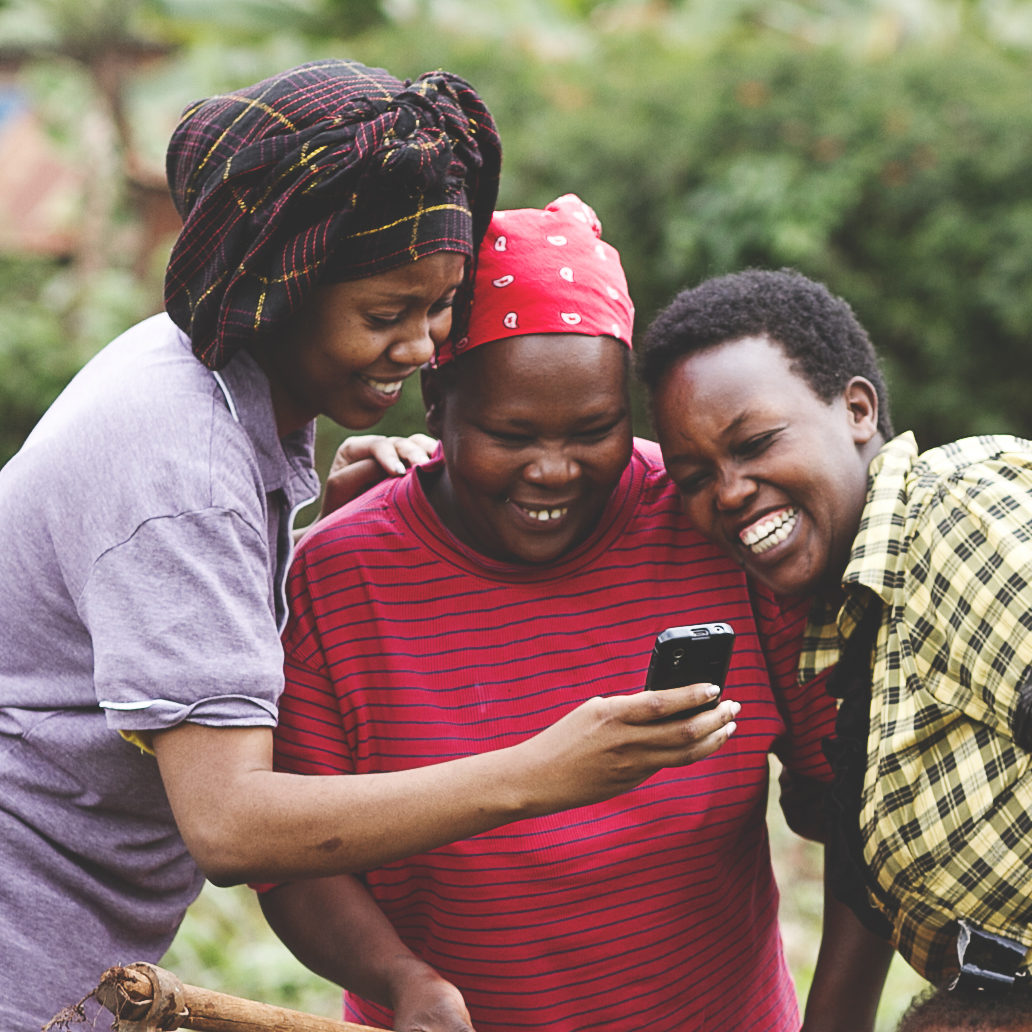 Farmers using A Mobile Phone